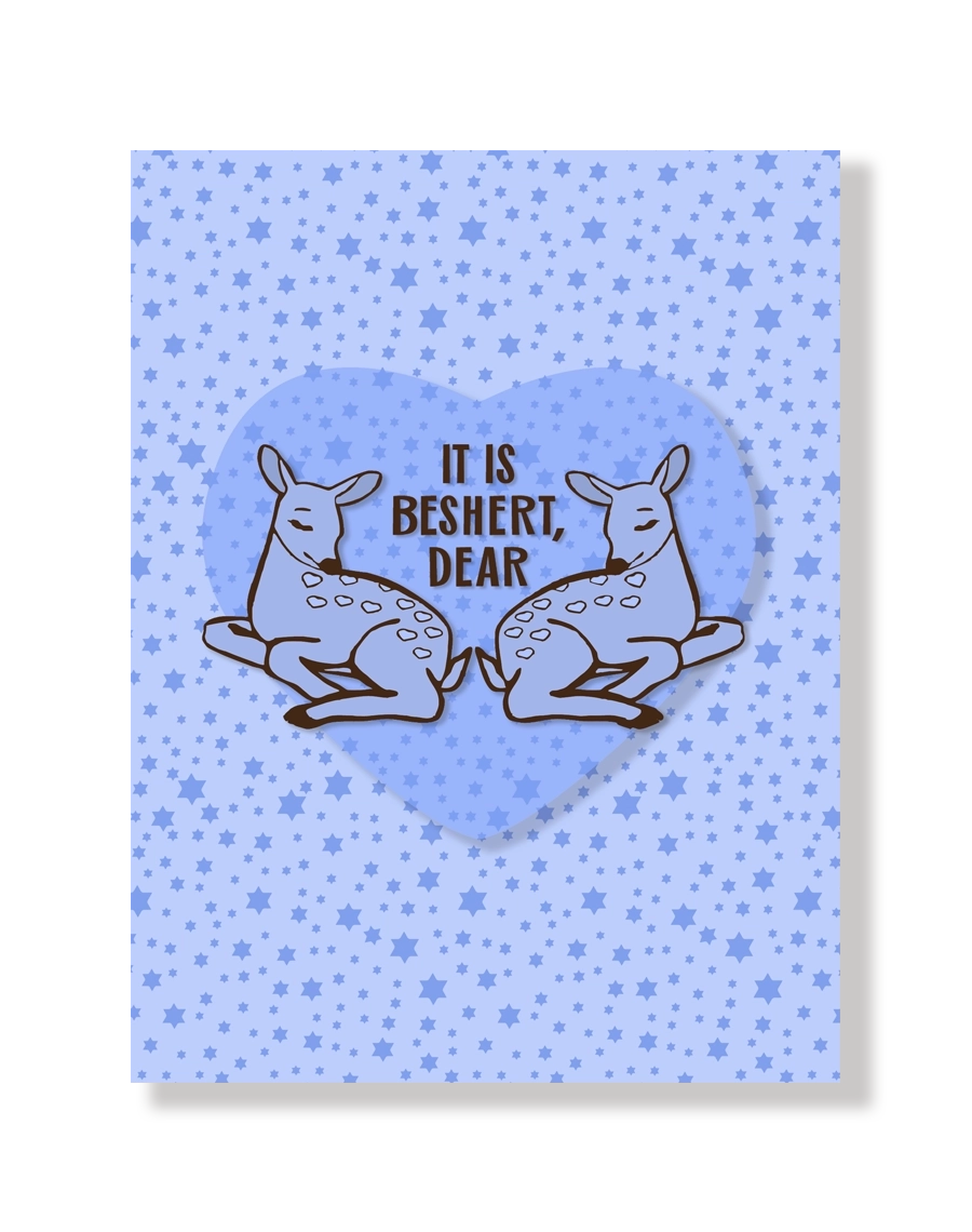 Card with two deer in a heart shape and text 'It is Beshert, Dear' on a blue star-patterned background.